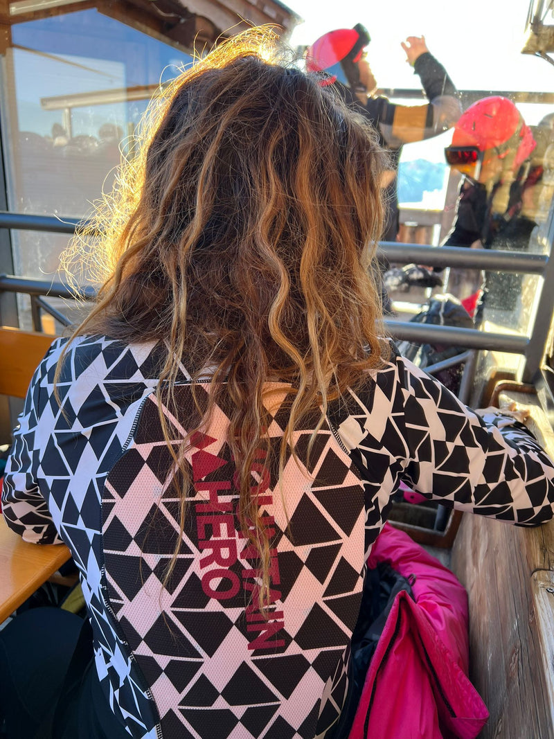 Meisje met skipully met rugbeschermer Mountain tri